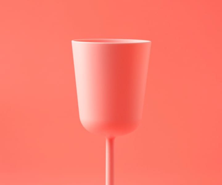 A red glass representing standing out